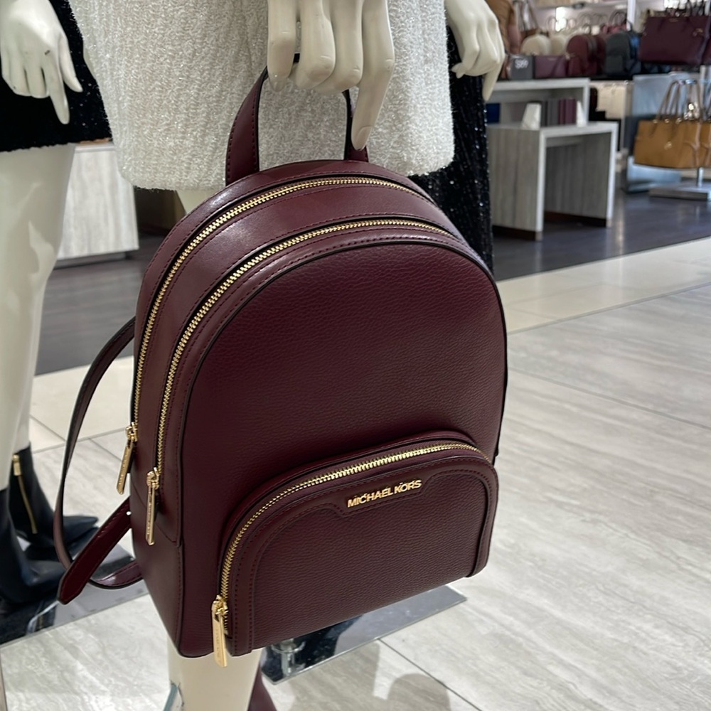Michael Kors Jaycee Medium Pebbled Leather Backpack
Oxblood/Golden NWT - Picture 8 of 16